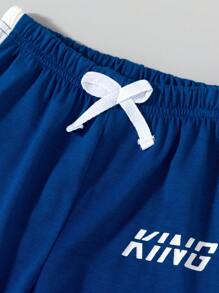 SHEIN Explorewe 2 件装年轻男童休闲圆领字母印花拼色短袖上衣和裤子套装