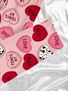 Set de 2 pièces de pyjama pour adolescentes, tenue décontractée confortable avec imprimé cœurs sur tout le Top à col rond à manches courtes et pantalon long