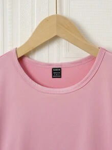 Set de pijama de 2 piezas para mujer con blusa de unicolor rosa de manga corta y pantalones 3/4 impresos con flores