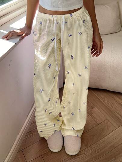 Aloruh سراويل طويلة مريحة للسيدات ذات الخصر المنخفض والأنيقة والجذابة مع طباعة الشريط المزخرف، متعددة الاستخدامات