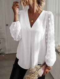 Camicetta da donna taglie forti con maniche a lanterna, scollo a V, motivo jacquard e colore unito