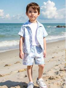 SHEIN Conjunto de camisa de manga corta y pantalones cortos de lino con estampado tropical de plantas para niño joven, ideal para vacaciones de verano