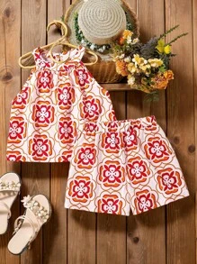 SHEIN Set de 2 piezas de top halter estampado y shorts casuales de estilo de vacaciones de verano para niñas pre-adolescentes, talla grande