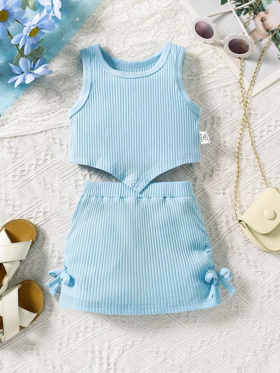 SHEIN Conjunto elegante de blusa con bajo asimétrico y minifalda decorada con moño para bebé niña. Conjunto de ropa delgada de verano para bebé niña - Azul - Ver 1