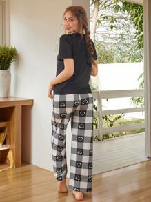 SHEIN Leap Crew 2pcs Teen Girls Simple Heart Print Round Neck Short Sleeve T-Shirt + Plaid Pattern Loose Fit Straight Leg Pajama Pants, Flameproof Sleepwear Set - Black and White - View 2