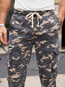 Manfinity Homme Jeans holgados de camuflaje con pierna entallada para hombres