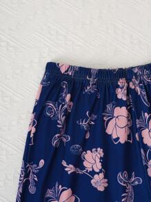 Set de pijama de 2 piezas para mujer con blusa de unicolor rosa de manga corta y pantalones 3/4 impresos con flores