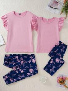 Set de pijama de 2 piezas para mujer con blusa de unicolor rosa de manga corta y pantalones 3/4 impresos con flores