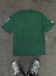Manfinity EMRG Camiseta de manga corta holgada para hombre con gráfico de eslogan y hombros caídos