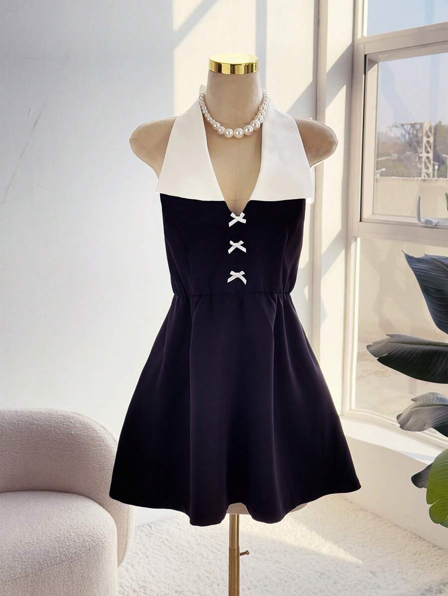 SHEIN Unity 大码优雅女士短款无袖连衣裙，饰有蝴蝶结、珍珠和链条 - 黑與白 - 查看 1