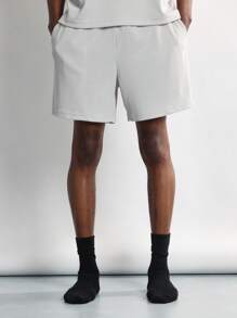 SUMWON Conjunto de ropa de estar en casa de dos piezas con costillas, ajuste relajado, camiseta de manga corta y shorts con cintura elástica, ropa de verano para usar cómodamente en actividades ligeras