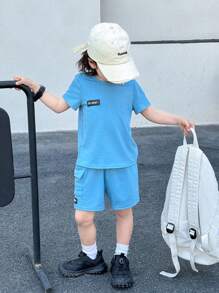 SHEIN 6 件套年轻男孩舒适休闲百搭日常穿着简约设计运动风宽松圆领短袖 T 恤和口袋短裤针织服装，适合春夏季、日常穿着、运动、外出、学校、派对、节日、拍照、返校