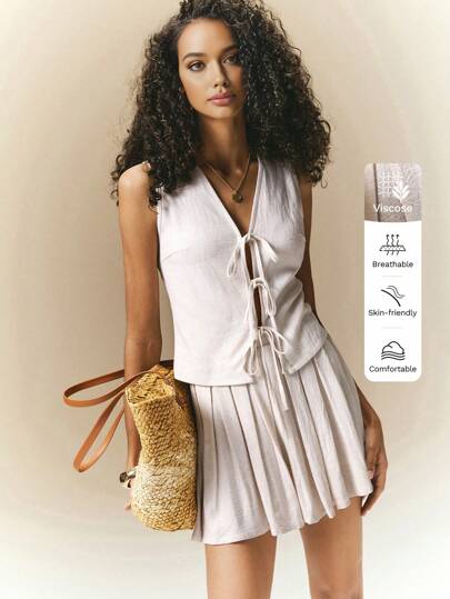 Poéselle 轻松打造时尚前系带 V 领上衣和半身裙套装 - 温暖夏日的完美之选，V 领上衣前系带百褶裙套装，女士度假套装，夏季服装，百褶裙款式，亚麻套装