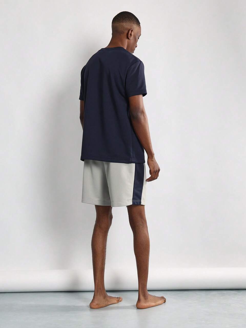 Conjunto de camiseta e shorts de manga curta respirável