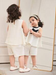 女婴 2 件套：白色无袖吊带上衣，黑色领口，黑色宽松长裤，3D 蝴蝶结装饰，适合上学、四季、外出旅行 - 米色 - 查看 2