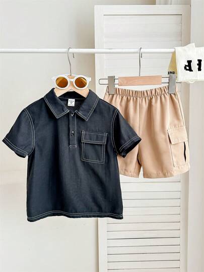 SHEIN Leap Crew 2 件装年轻男孩休闲运动度假装饰领短袖落肩黑色衬衫和松紧腰工装短裤套装，适合儿童服装，年轻男孩服装，返校，男孩套装适合生日派对、晚会、表演、婚礼、开幕、日常使用、学校、旅游、运动、春夏季节