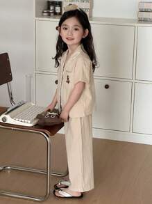 DAZY Conjunto informal de niña con blusa de manga corta a cuadros y pantalones, ideal para primavera/verano