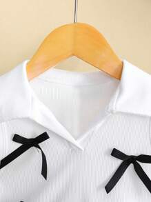 Set de 2 piezas: Chaleco con cuello de lazo 3D y falda plisada, conjunto adecuado para el estilo escolar de verano para niña joven