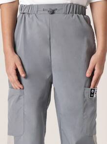 SUMWON 弹性裤脚运动裤，运动性能尼龙慢跑裤，带实用口袋，侧面板细节，街头风格，青少年训练裤 - 灰色 - 查看 6