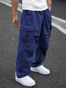 Manfinity Homme Spodnie dresowe męskie w jednolitym kolorze, kieszenie cargo, plisowane, szerokie nogawki, plus size