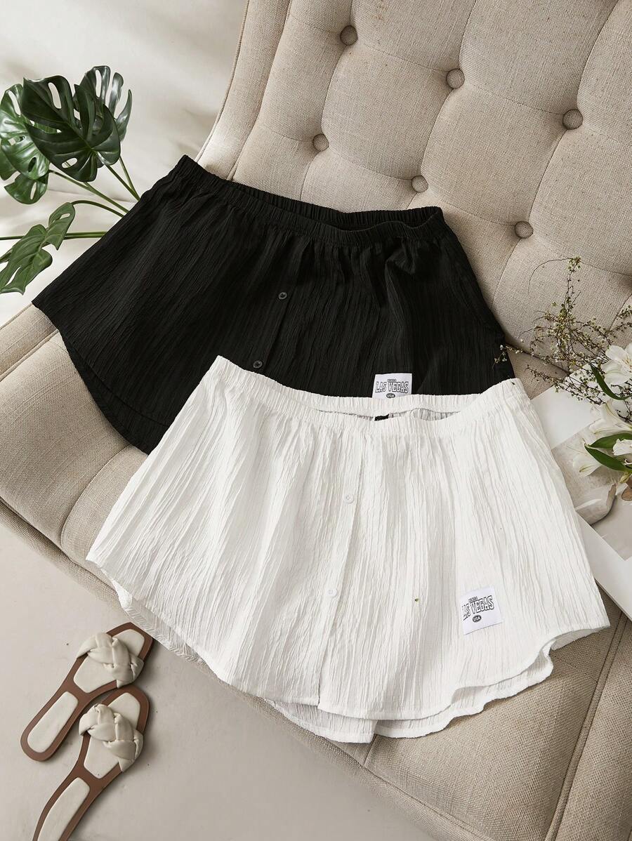 SHEIN Essnce Conjuntos de verano para mujer: Conjunto de playa, conjunto de negocios casuales, conjunto de salón, sudadera, camiseta casual de gimnasio, falda con dobladillo falso y dos paquetes de falda con borde blanco para cubrir el trasero - Blanco y Negro - Ver 1