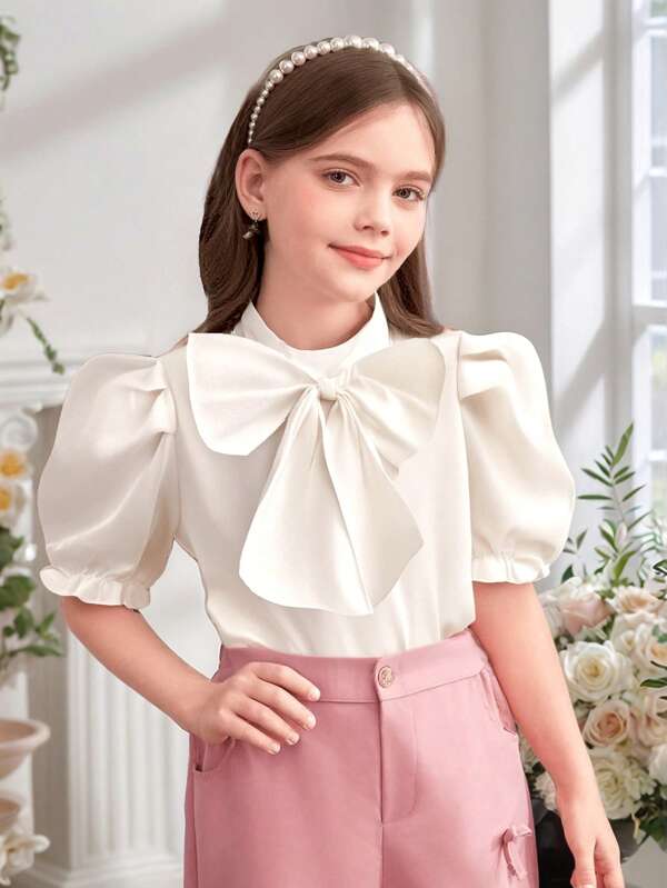 Blusa blanca de manga abullonada de princesa para niñas preadolescentes, que combina la diversión y la elegancia, una elección ideal para niñas pequeñas