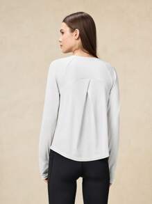 OutZeal Camiseta técnica de manga larga con pliegue cruzado y protección solar para mujer, ideal para senderismo y entrenamiento