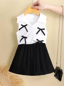 Set de 2 piezas: Chaleco con cuello de lazo 3D y falda plisada, conjunto adecuado para el estilo escolar de verano para niña joven