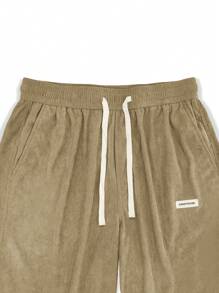 Manfinity Hypemode Pantalones de pana holgados para hombre con parche con letras