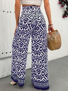 EURMUSE Boho Ikat-Print Wide-Leg Pants - Blue & White | Elevate Your Summer Style With These Striking Ikat-Print Pants, Featuring A Relaxed Wide-Leg Fit And Lightweight, Airy Fabric For Ultimate Comfort. Perfect For Beach Days, Vacations, Or Adding A Pop Of Color To Your Everyday Wardrobe, These High-Waist Pants Combine Bold Patterns With Effortless Elegance - Blue - View 2