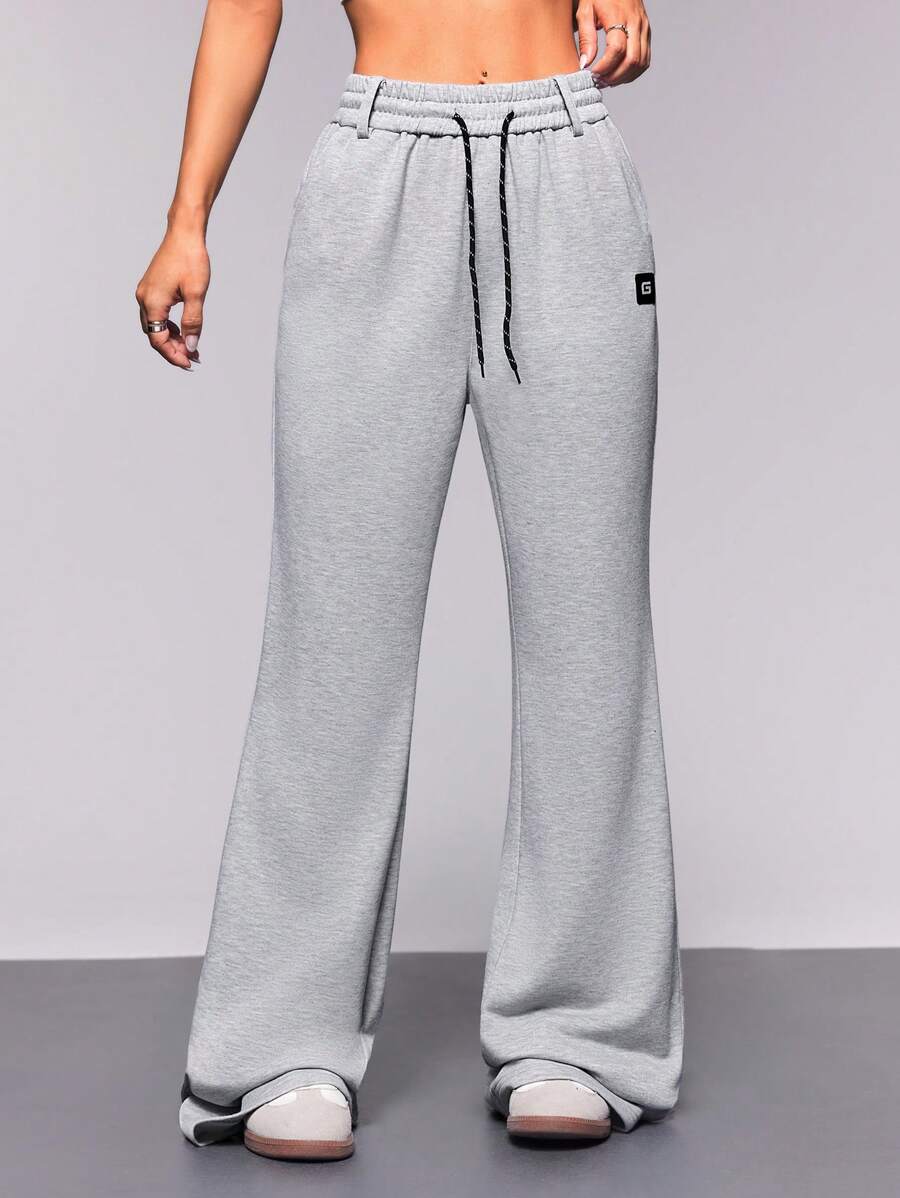 SHEIN Sports Pantalon de sport évasé à taille avec cordon de serrage pour femmes - Gris pâle - Voir 1
