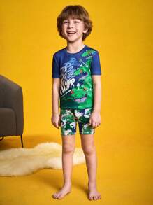 Nick 90s | SHEIN Conjunto de pijama con estampado de dinosaurio en bloques de color para niño, primavera/verano