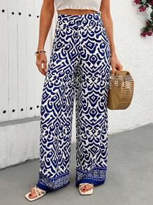 EURMUSE Boho Ikat-Print Wide-Leg Pants - Blue & White | Elevate Your Summer Style With These Striking Ikat-Print Pants, Featuring A Relaxed Wide-Leg Fit And Lightweight, Airy Fabric For Ultimate Comfort. Perfect For Beach Days, Vacations, Or Adding A Pop Of Color To Your Everyday Wardrobe, These High-Waist Pants Combine Bold Patterns With Effortless Elegance - Blue - View 1