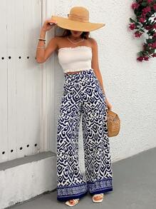 EURMUSE Boho Ikat-Print Wide-Leg Pants - Blue & White | Elevate Your Summer Style With These Striking Ikat-Print Pants, Featuring A Relaxed Wide-Leg Fit And Lightweight, Airy Fabric For Ultimate Comfort. Perfect For Beach Days, Vacations, Or Adding A Pop Of Color To Your Everyday Wardrobe, These High-Waist Pants Combine Bold Patterns With Effortless Elegance - Blue - View 5