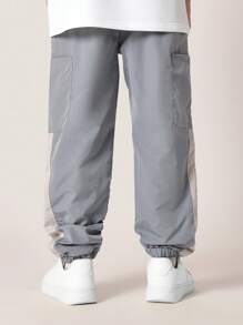 SUMWON 弹性裤脚运动裤，运动性能尼龙慢跑裤，带实用口袋，侧面板细节，街头风格，青少年训练裤 - 灰色 - 查看 4