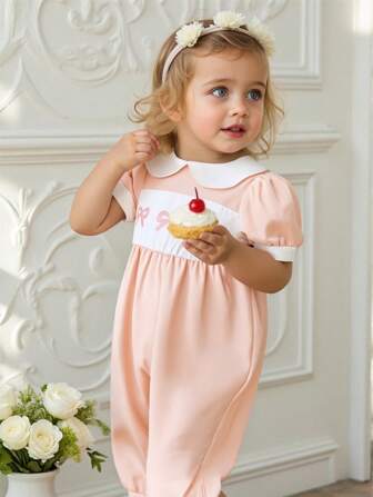 Souflis Souflis 复古法式甜美公主风撞色彼得潘领泡泡袖收腰连体裤，饰有蝴蝶结和花卉印花，俏皮可爱，适合外出和派对穿着