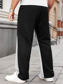 Manfinity Homme Pantalones de chándal casuales con cintura ajustable y pierna ancha de color contrastado talla grande para hombre