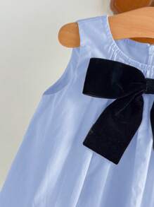 Cozy Pixies فستان طفلة بلا أكمام وياقة دائرية مزين بفيونكة كبيرة