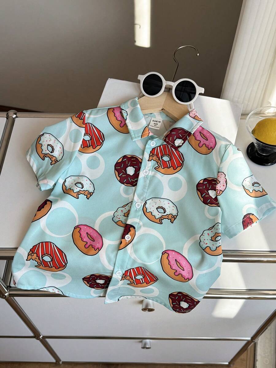 SHEIN 1pc Young Boy Casual School Style Comfortable & Fashionable Sweet Minimalist Multi-Purpose Soft Cute Donut Print Short Sleeve Collar Shirt Top, Suitable For Vacation, Spring/Summer, Holidays, Daily Wear - Blue - View 1