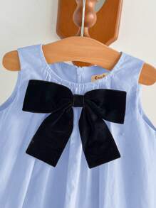 Cozy Pixies فستان طفلة بلا أكمام وياقة دائرية مزين بفيونكة كبيرة