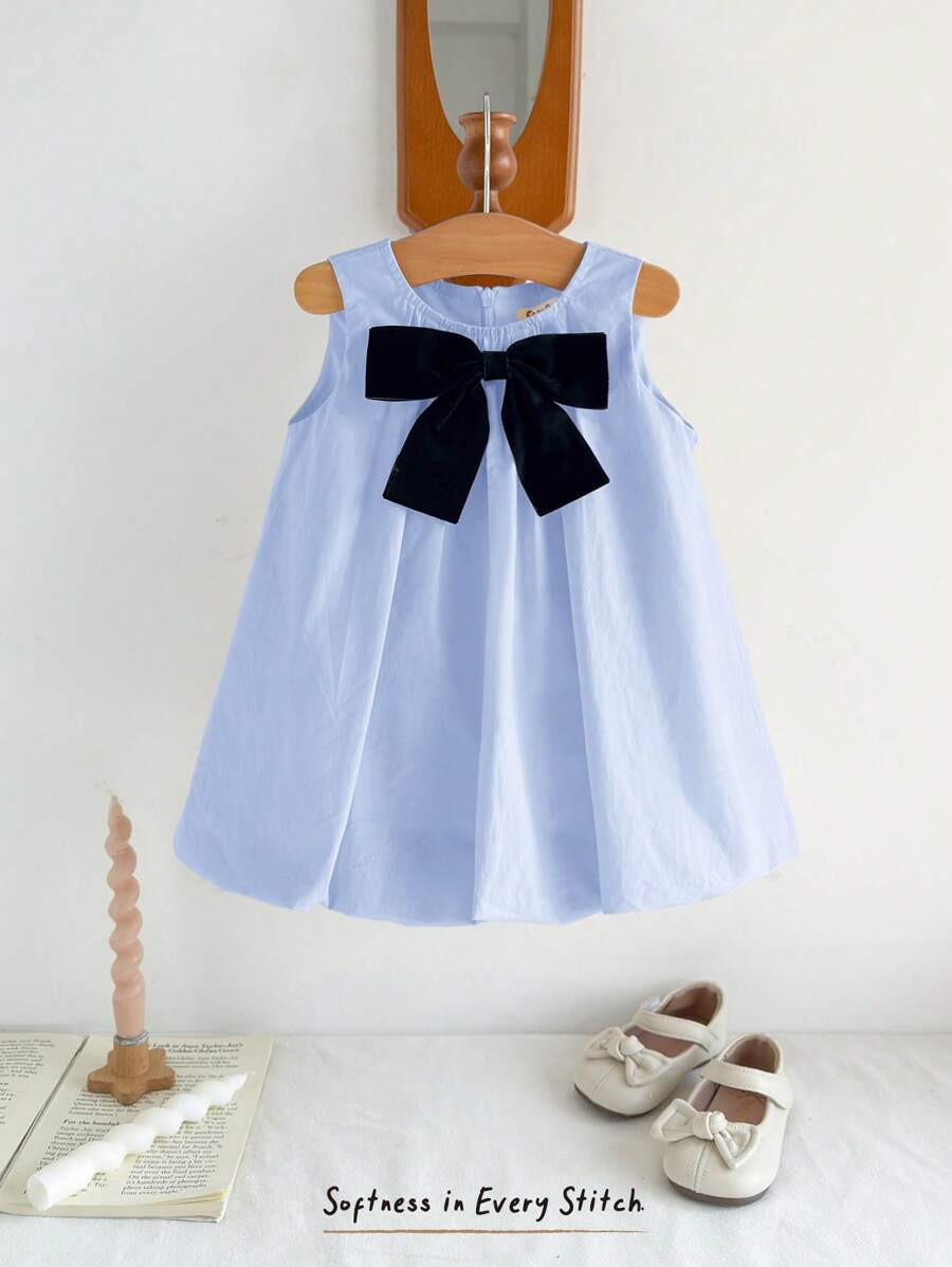 Cozy Pixies فستان طفلة بلا أكمام وياقة دائرية مزين بفيونكة كبيرة