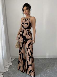 Elenzga Mono con cintura entallada de tela estampada para mujer, elegante para vacaciones y uso diario con cuello de halter