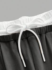 Coolane Conjunto de 2 piezas de moda para mujer, top y pantalones de 2 en 1 con empalmes de color contrastante, apropiado para usar de manera informal en primavera y verano