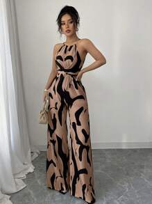 Elenzga Mono con cintura entallada de tela estampada para mujer, elegante para vacaciones y uso diario con cuello de halter
