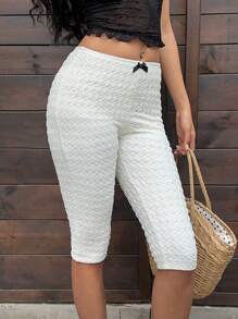 SHEIN EZwear Abrikoos getextureerde 3/4 legging, eenvoudig en modieus, geschikt voor de zomer