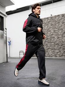Gym Rark Conjunto deportivo de chaqueta con capucha y pantalones con bloque de color y estampado de letras para hombres, conjunto de gimnasio, conjunto de entrenamiento - Negro - Ver 1