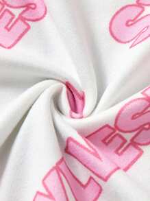 LOONEY TUNES X SHEIN طقم سروال قصير كاجوال أسود و تيشيرت نصف كم مطبوع بنقشات فتاة المراهقة القطة السوداء والبطة الصفراء والرسوم الوردية