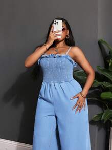 Slaydiva Jumpsuit aus blauem Denim in Große Größen mit sexy Trägern und weitem Bein
