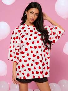Manfinity VCAY Camiseta de manga corta unisex de corte holgado, cuello redondo y hombros caídos con estampado de pequeños corazones en todo el diseño