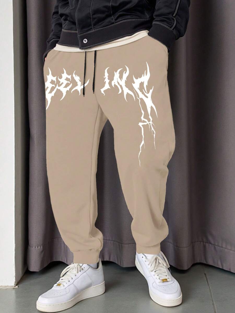 Manfinity LEGND Quần nỉ nam in chữ có dây rút ở eo thường ngày - Màu Khaki - Xem 1